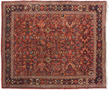 Detailed Herati floral motif with interlaced palmettes and vinery covering a vintage Persian Mahal carpet.