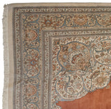 Intact side cord selvage and corner spandrel of a vintage Persian Tabriz carpet.