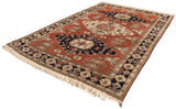 Persian Meshkin carpet with copper red field, triple medallions, and abrash.