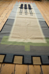Hand woven vintage Kilim runner displaying abstract sage green and charcoal geometric blocks.