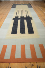 Terra cotta and silver geometric blocks of an abstract contemporary Kilim rug runner.