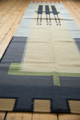 Abstract geometric design with architectural stepped blocks on a vintage Kilim runner.
