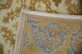 Hand-knotted vintage Spanish Alcaraz carpet: saffron border with blue stylized motifs, intact selvage.