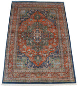 Terra cotta samovar turtle design main border with blue and green geometric motifs.
