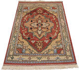 Indian Serapi Soumac rug with brick red stepped medallion, intricate palmettes, abrashed beige ground.