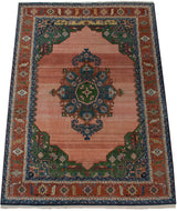 Vintage Indian Serapi rug corner, geometric borders, denim blue, forest green motifs, fringe.