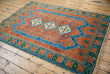Vintage Indian Caucasian design rug corner, terra cotta and sapphire blue geometric border, secure fringe.