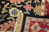 Hand-knotted Serapi Soumac rug with beige fringe, original selvage, and floral motifs.