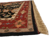 Vintage Indian Serapi Soumac border with wine red, ivory band, black field palmettes, and beige fringe.