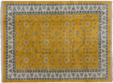 Vintage Indian Art Deco carpet, saffron yellow field, blue star and floral motifs, ivory borders.
