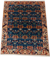 Sapphire blue geometric plant motifs and tribal terra cotta border on Turkish Azeri carpet.