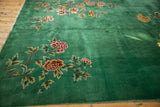 Vivid emerald green field featuring intricate Art Deco floral sprays in blush and wine red.
