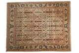 Ivory Vintage Agra carpet, repeating trellis of germinating plants in wine red, olive, aqua.