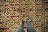 Traditional ivory paneled plant trellis on vintage Agra carpet in wine red, olive, aqua.