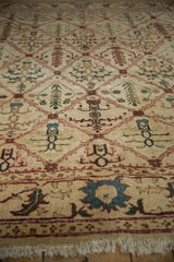 Vintage Agra carpet: ivory trellis pattern, germinating plants, wine red, olive, aqua, fringe.