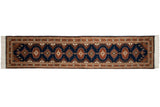 Vintage Indian Turkmen design runner with navy blue, rust, ivory repeating geometric medallions, 2'6