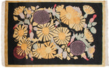 Art Deco Indian carpet corner with gold starburst floral bouquet, abrashes, and cream fringe.