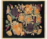 Hand knotted Indian Art Deco rug, large starburst floral bouquet: black, gold, mauve, green.
