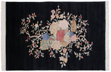Bottom right corner of the Indian Art Deco carpet, displaying delicate vinery, blush roses, and ivory fringe.