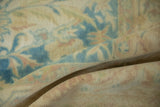 Detail of the soft, low pile of the vintage carpet, showing its even wear and pliable texture.