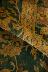 Vintage Agra carpet's folded pile reveals copper and dusty teal Herati motif.