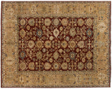 Indian Agra carpet with oversize palmettes on a cherry red field and a wide beige border.