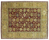 Close-up of the Agra carpet's wide wheat border next to the cherry red palmette-filled field.