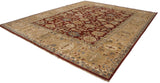 High-angle view of a large Agra carpet with a red palmette field and wide sand-colored border.