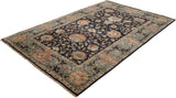 Angled perspective of a new Agra carpet with an allover floral design on a charcoal black field.