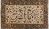 Indian Serapi design carpet with a central medallion, ivory field, and an elaborate olive green border.
