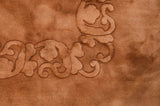 Vintage Art Deco rug with dimensional, shadow embossed foliage carving, copper tones.