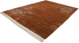 Shadow embossed curvilinear Art Deco border on copper field with light ivory fringe.