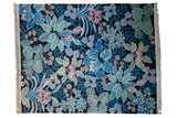 Vintage Jungle carpet: black ground, blue, green, and pink foliage, full pile, 8'2