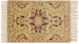 Vintage Armenian Sultanabad rug with a central floral medallion in dusty blush and navy on a beige field.