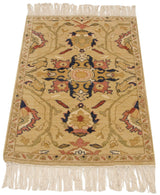 Angled view of a vintage Armenian Sultanabad rug showing its full pile and ivory fringe.