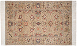 Vintage Sultanabad carpet with scrolling vinery and floral palmettes on a sandy beige field.
