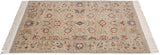 Angled view of a vintage Sultanabad rug showing its lush, full pile and allover floral pattern.