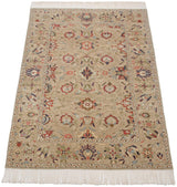 A perspective view of the vintage Armenian carpet highlighting its intricate allover floral and vine pattern.
