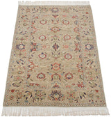 Vintage Sultanabad design carpet shown at an angle, highlighting the lush texture and floral pattern.