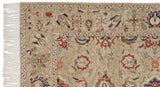 Plush corner of the vintage Armenian rug with its neat ivory fringe and floral palmette border.