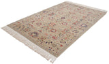 Vintage Armenian Sultanabad rug with an all-over pattern of floral palmettes, viewed from a high angle.