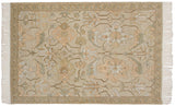 Armenian Sultanabad rug corner with pale apricot palmettes, geometric vines, and rhythmic border.