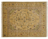 Vintage Armenian Heriz carpet featuring a saffron field, quatrefoil medallion, and Samovar turtle border.