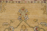 Vintage Armenian Heriz design rug: saffron field with floral arrangements and winding vinery.