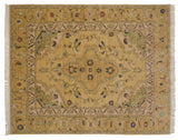 Detail of vintage Armenian Heriz carpet: saffron gold field, floral vinery, navy, sage accents.