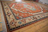 Vintage Armenian Serapi rug with its oblong sky blue medallion on a madder red field.