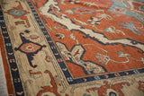 Hand-knotted Vintage Armenian Serapi rug, close-up of brick red field and navy border pattern.