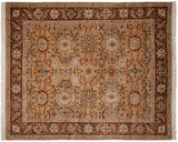 Vintage Sultanabad design carpet with allover palmettes and vinery in rust and beige tones on a sandy wheat field.