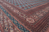 Angled view highlighting the fine weave and complex geometric borders of a Bokhara carpet.