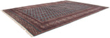 Long perspective view of the vintage Bokhara carpet's lustrous wool and geometric design.